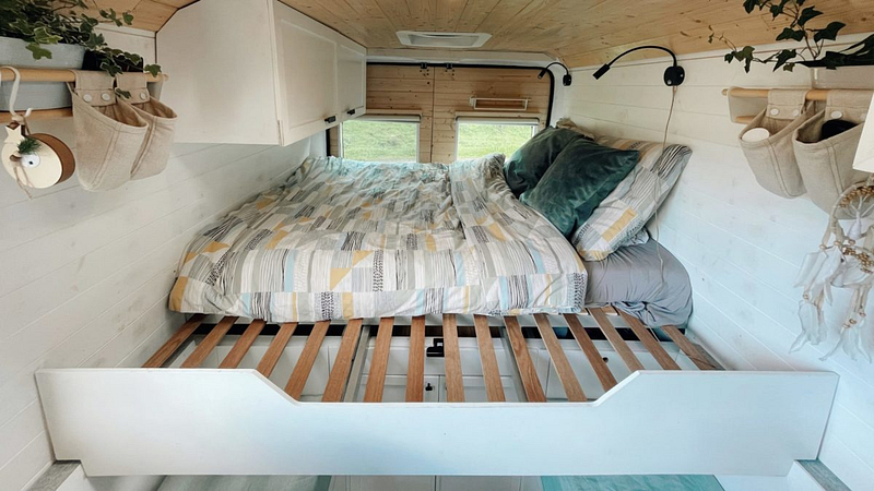 Self built slide out bed to utilize space in a van