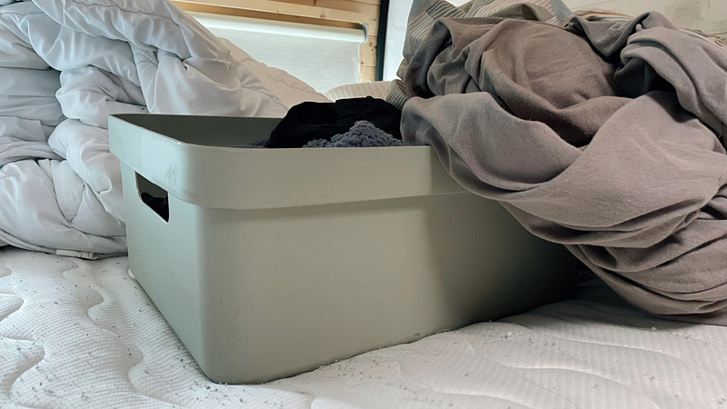 Laundry basket with dirty laundry